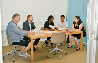Image of people in a mediation room